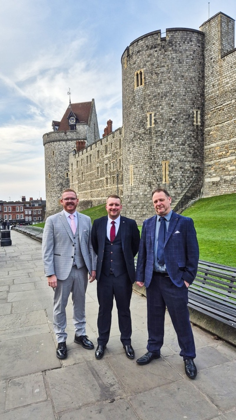 Other image for Proud day as band members meet King Charles